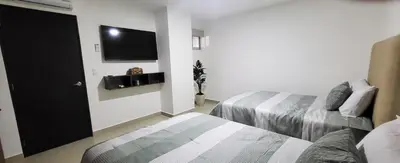 Cama o camas de una habitación en Torre Alba 103