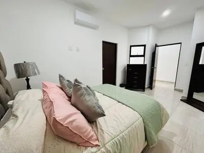 Cama o camas de una habitación en Aleman 13, Centrico depa cerca de la playa