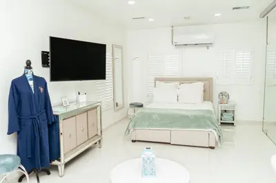 Cama o camas de una habitación en Luxury Lofts With Private Pool