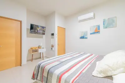 Cama o camas de una habitación en Penthouse Con Terraza en Zona Dorada