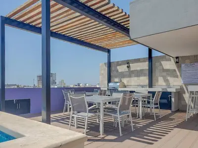 Un balcón o terraza de Penthouse Con Terraza en Zona Dorada