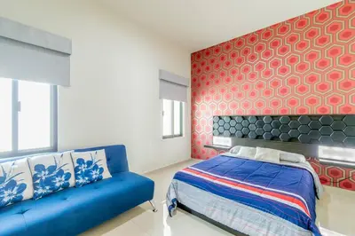 Cama o camas de una habitación en Penthouse Con Terraza en Zona Dorada