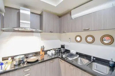 Una cocina o zona de cocina en Bonito condo Zona Dorada con Piscina y Cochera