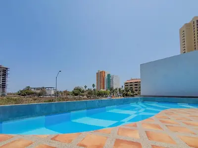 Piscina en o cerca de Lindo Condo a 1 cuadra de la playa