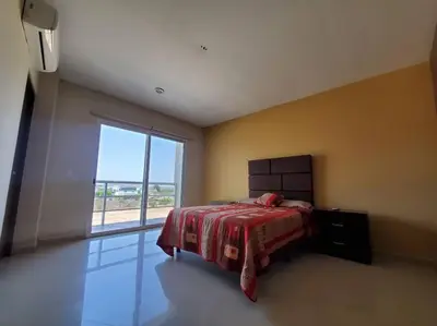 Cama o camas de una habitación en Grande Condo 1 Cuadra de Playa