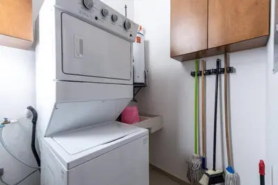 Una cocina o zona de cocina en Departamento a 2 minutos de la playa by G P S rentas