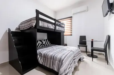 Cama o camas de una habitación en Departamento a 2 minutos de la playa by G P S rentas