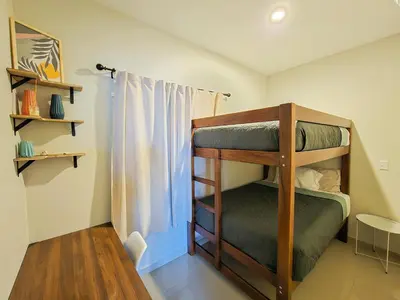Cama o camas de una habitación en Condominio en Lomas de Mazatlán