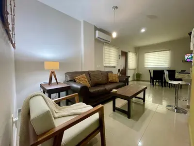 Zona de estar de Charming Condo in Gaviotas Walk to Beach cafes, restaurants within Golden Zone