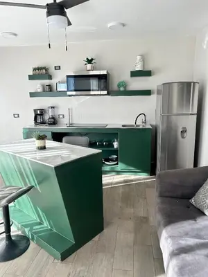 Una cocina o zona de cocina en HOTEL and Suites Cananea