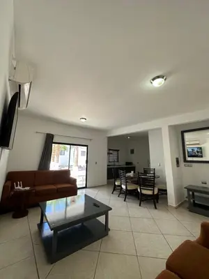 Una televisión o centro de entretenimiento en Condominio Rocamar