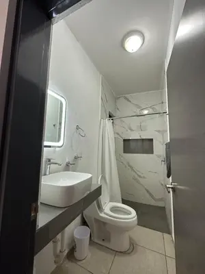 Un baño de Condominio Rocamar