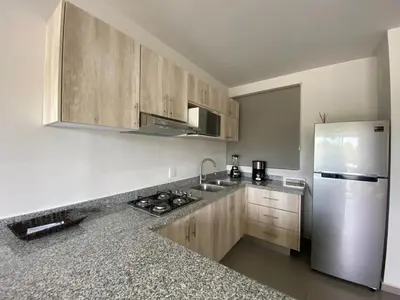 Una cocina o zona de cocina en Excelente Departamento con Alberca en Zona Exclusiva de Mazatlán - Residencial Coto Mareta 5
