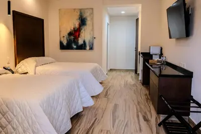 Cama o camas de una habitación en Hotel Gran Avenida, Navojoa
