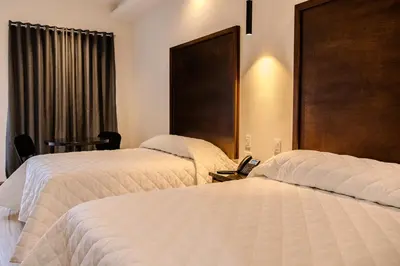 Cama o camas de una habitación en Hotel Gran Avenida, Navojoa