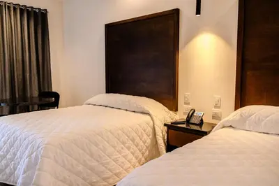 Cama o camas de una habitación en Hotel Gran Avenida, Navojoa