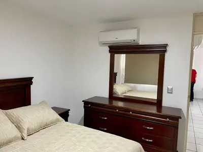 Cama o camas de una habitación en 301 Hermoso Dpto en Mazatlán muy cerca de la playa
