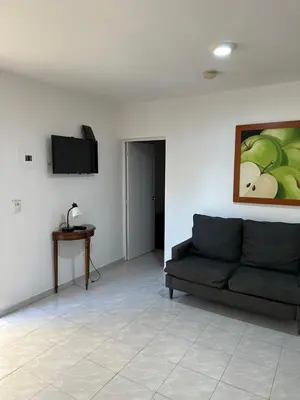 Una televisión o centro de entretenimiento en Apto comodo, muy cerca de playa 101