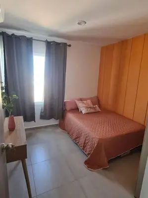 Cama o camas de una habitación en Departamento Vacacional en Mazatlán