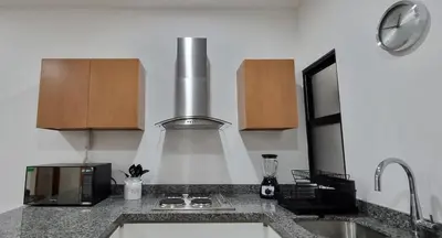 Una cocina o zona de cocina en Confortable Departamento