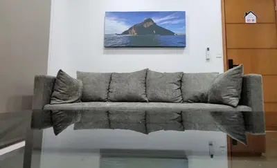 Zona de estar de Confortable Departamento