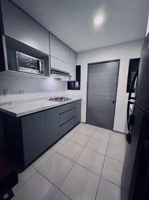 Una cocina o zona de cocina en E&S Estancia vacacional