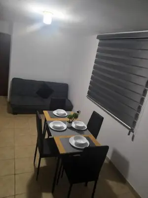 Zona de estar de Depa Eco en planta baja, a 5 minutos del malecon y zona dorada