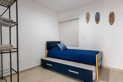 Cama o camas de una habitación en lindo y nuevo a 1 min de la playa by g p s rentas