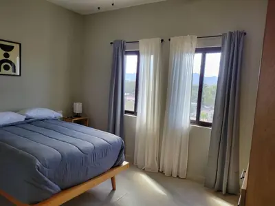 Cama o camas de una habitación en confortable, amplio departamento