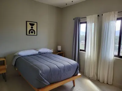 Cama o camas de una habitación en confortable, amplio departamento