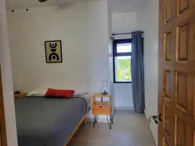 Cama o camas de una habitación en confortable, amplio departamento