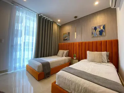 Cama o camas de una habitación en Camino al Mar Apartment Gold with Amazing View of the Ocean, Beach and Swimming Pool, 3 Rooms
