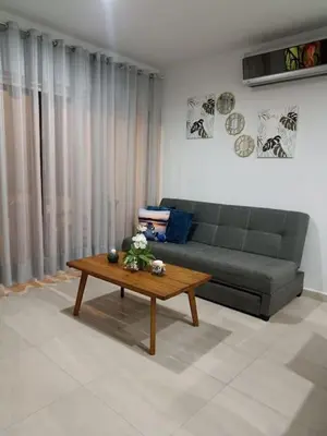 Zona de estar de Departamento Planta Baja, A 1 Minuto de la playa.