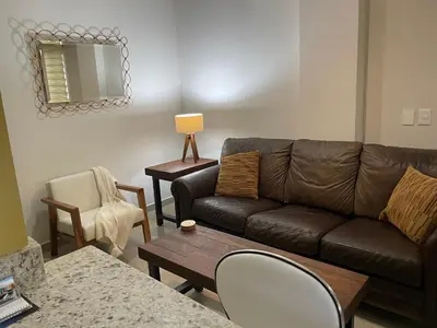 Zona de estar de Ground floor apartment close to the beach, shops and restaurants