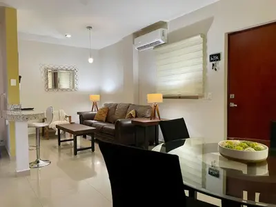 Zona de estar de Ground floor apartment close to the beach, shops and restaurants