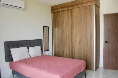 Cama o camas de una habitación en Hotel boutique cerca de Zona Dorada by G p s rentas