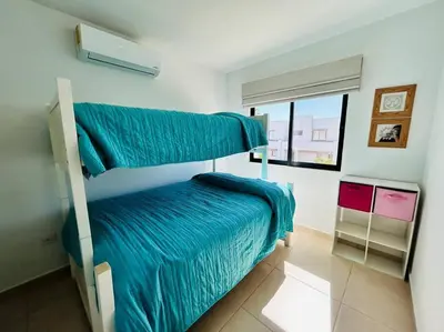 Cama o camas de una habitación en Hermosa casa a 2 min de la playa by PartnerHost