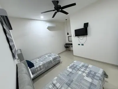 Cama o camas de una habitación en Departamento Isla Central 1