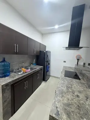 Una cocina o zona de cocina en Departamento Isla Central 1