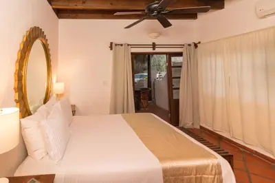 Cama o camas de una habitación en Hotel 1697 Loreto