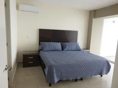 Cama o camas de una habitación en Brisa del Mar en Cristal Bay
