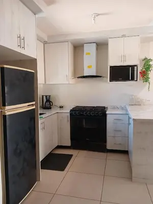 Una cocina o zona de cocina en Vivienda completa 2 plantas, y privada con acceso controlado