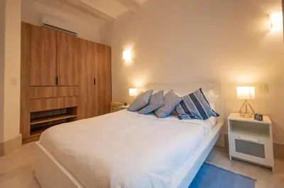 Cama o camas de una habitación en Vinícola Parvada Villa 8 servicio tipo hotel