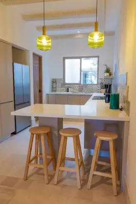 Una cocina o zona de cocina en Vinícola Parvada Villa 8 servicio tipo hotel