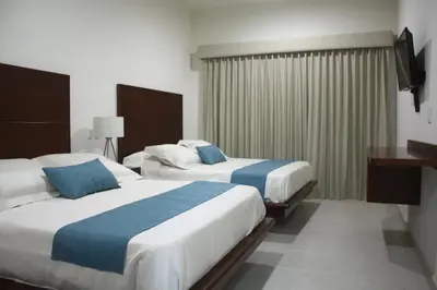 Cama o camas de una habitación en MARENA Suites & Apartments