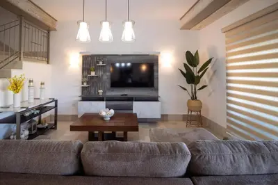 Una televisión o centro de entretenimiento en Villa Parvada 6