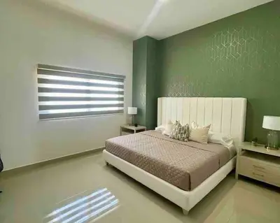 Cama o camas de una habitación en Acogedor Departamento a Pasos De La Playa