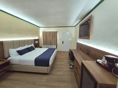 Cama o camas de una habitación en Las Misiones Hotel