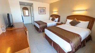 Cama o camas de una habitación en Las Misiones Hotel