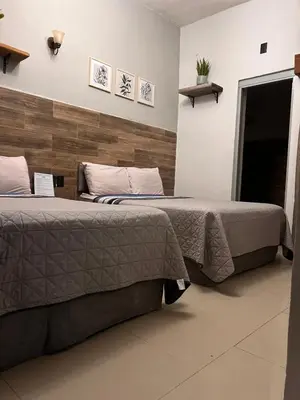 Cama o camas de una habitación en The Black Tree Hotel Boutique